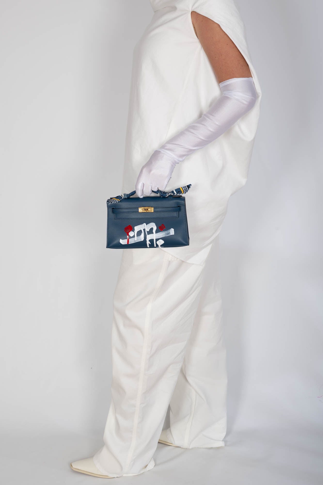 Hermès Kelly Pochette Bleu Nuit Swift Retna Artist Collaboration Gold Hardware