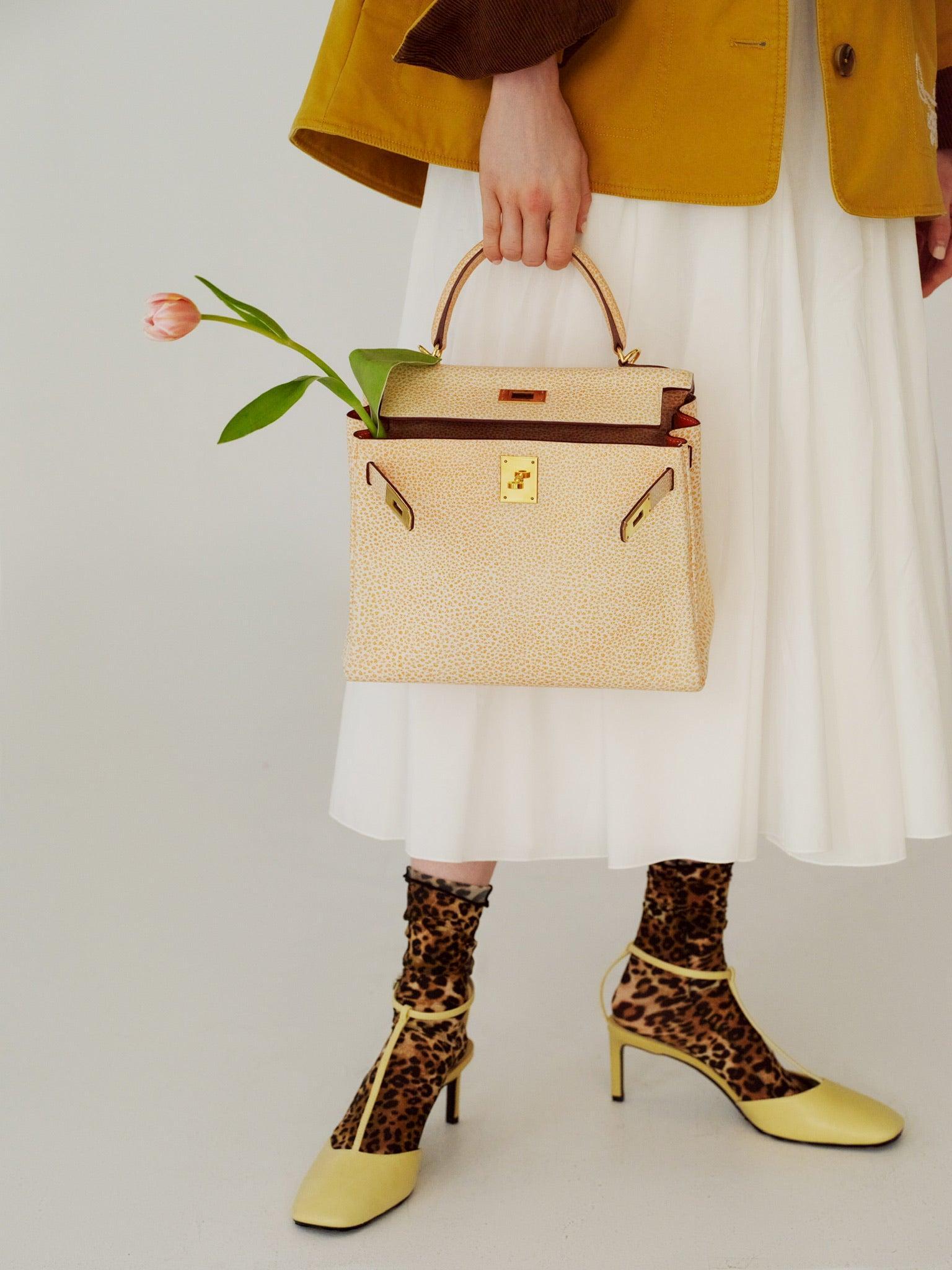 Hermès Kelly 28 Retourne Orange Dalmatian Buffalo Skipper Gold Hardware