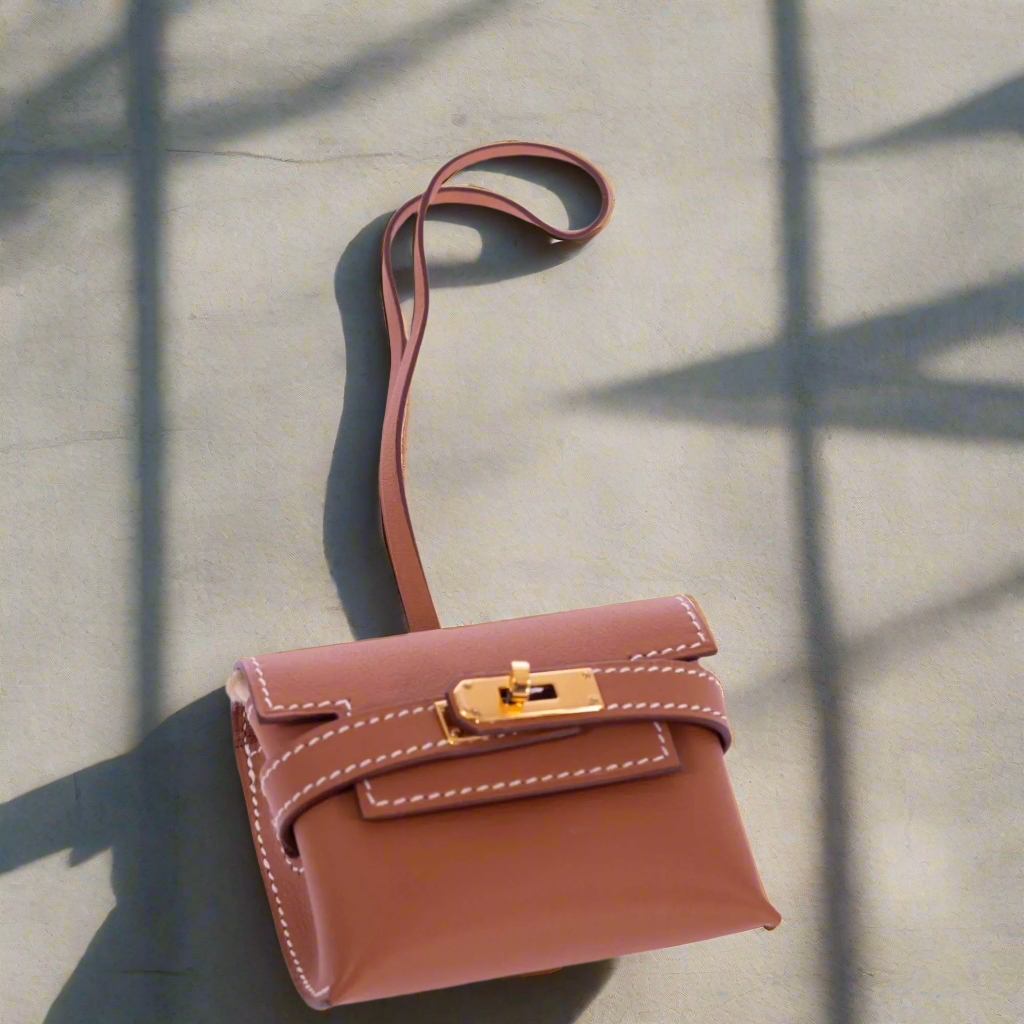 Hermès Kelly Festival Charm Gold Swift Gold Hardware | JANEFINDS