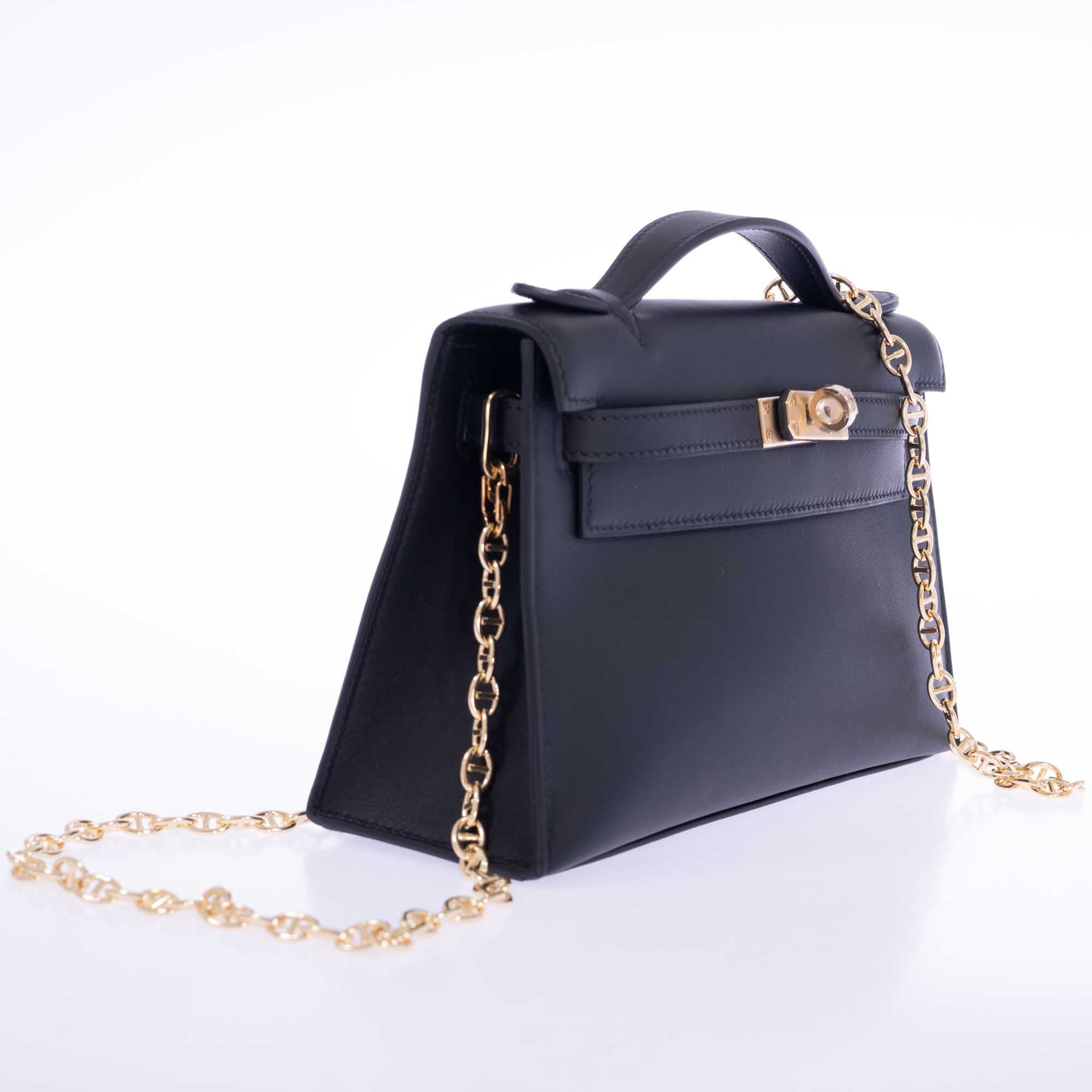 Hermès Kelly Mini Pochette Noir Swift Permabrass Hardware
