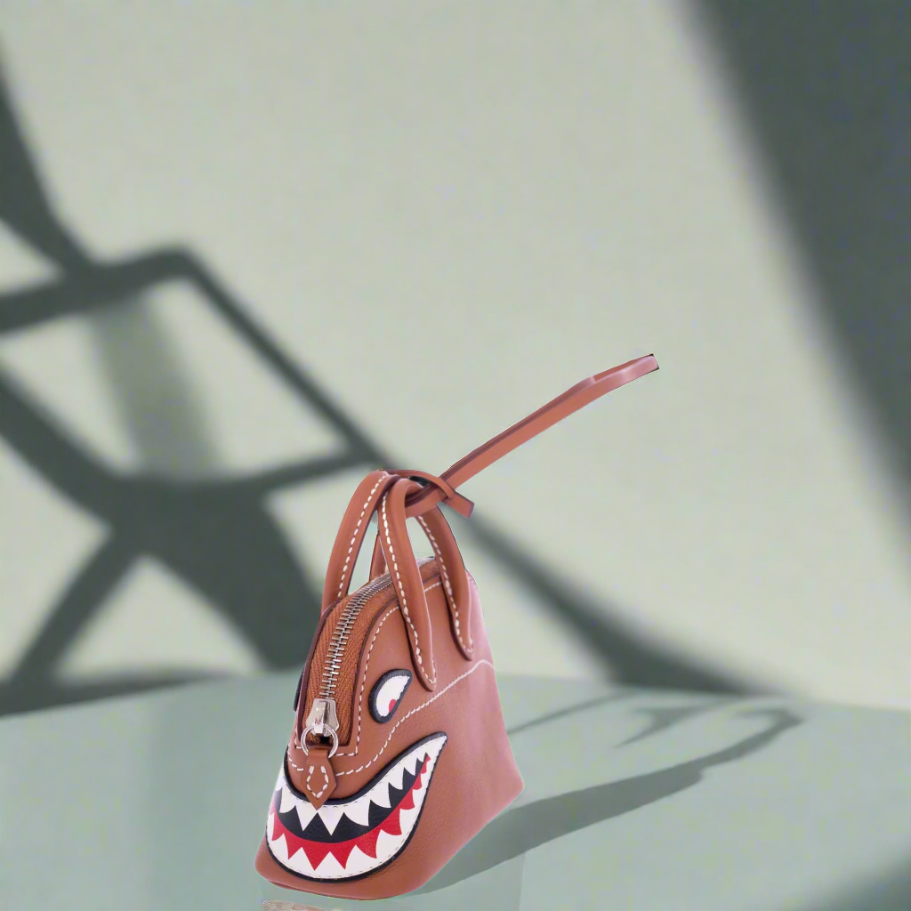 Hermès Mini Bolide Shark Charm Gold Swift Palladium Hardware