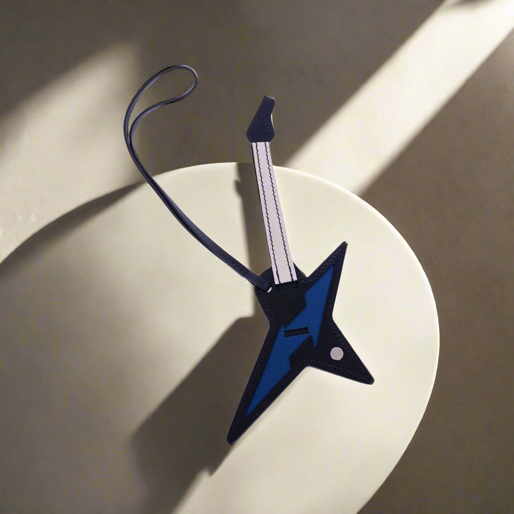 Hermès Rock Guitar Bag Charm | JANEFINDS