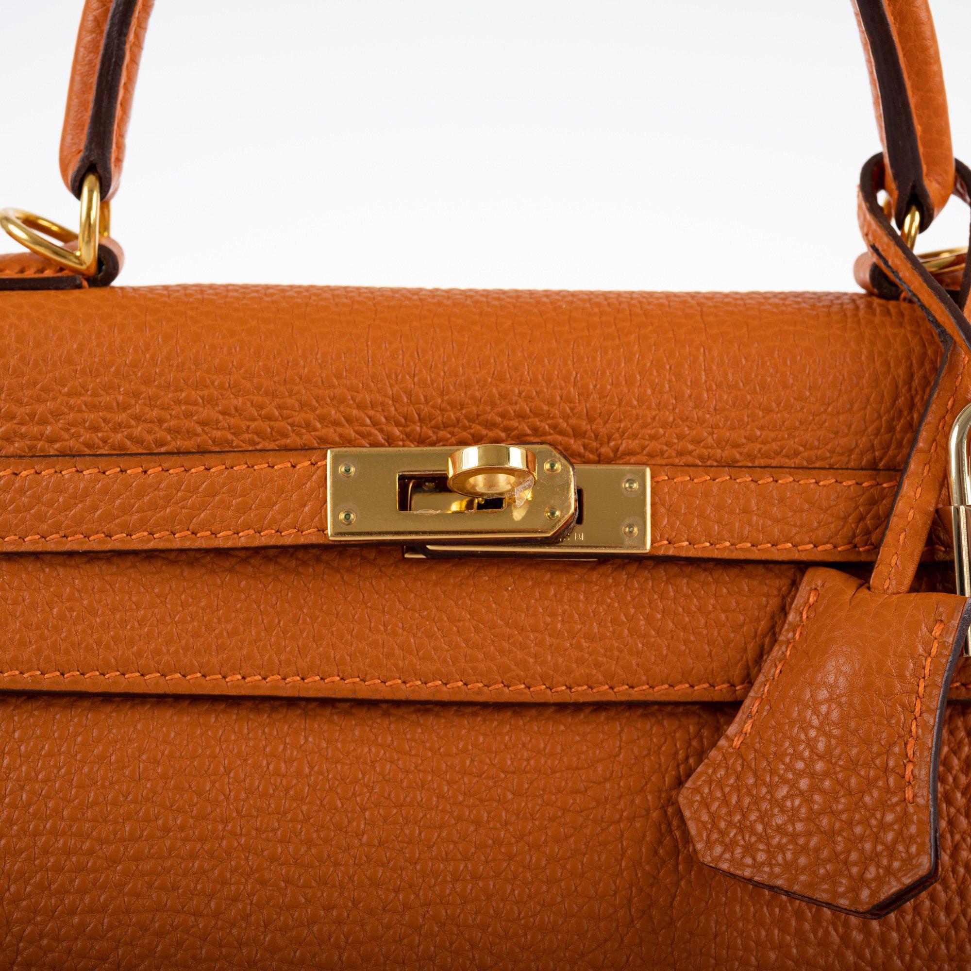 Hermès Kelly 25 Retourne Potiron Togo leather Gold Hardware