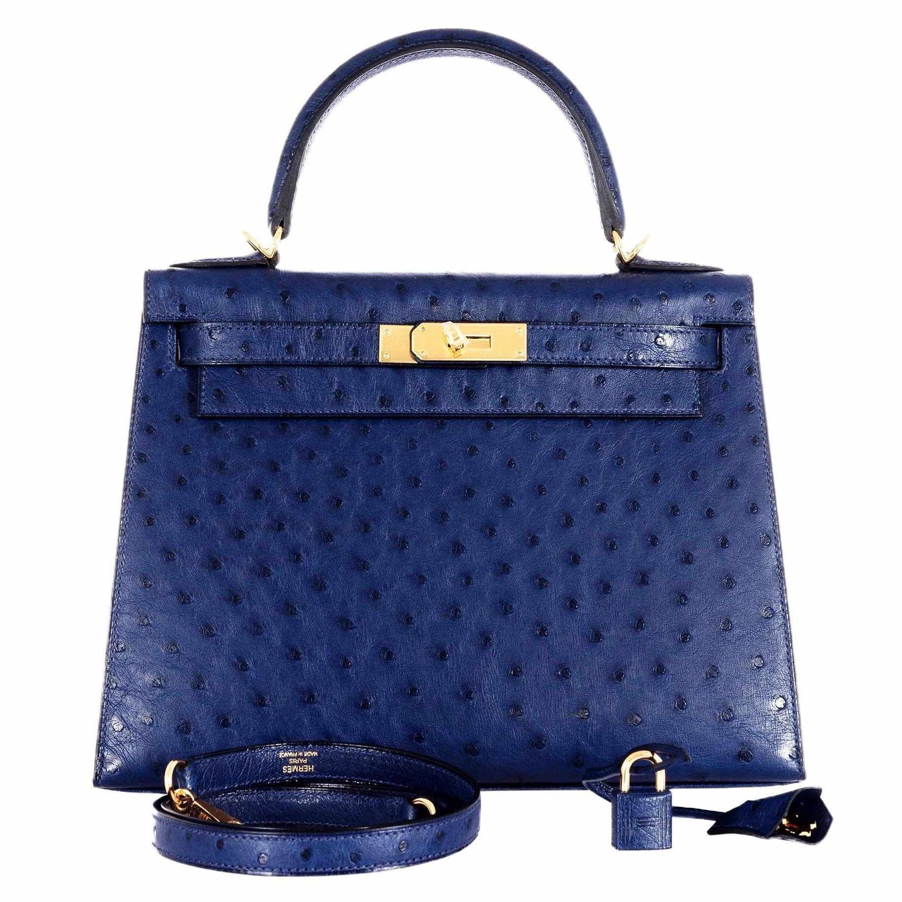 A DEEP BLUE OSTRICH SELLIER KELLY 28 WITH GOLD HARDWARE