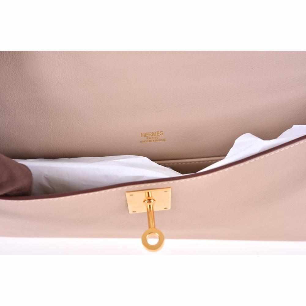 Hermès Kelly Cut Pochette Natural Swift Gold Hardware