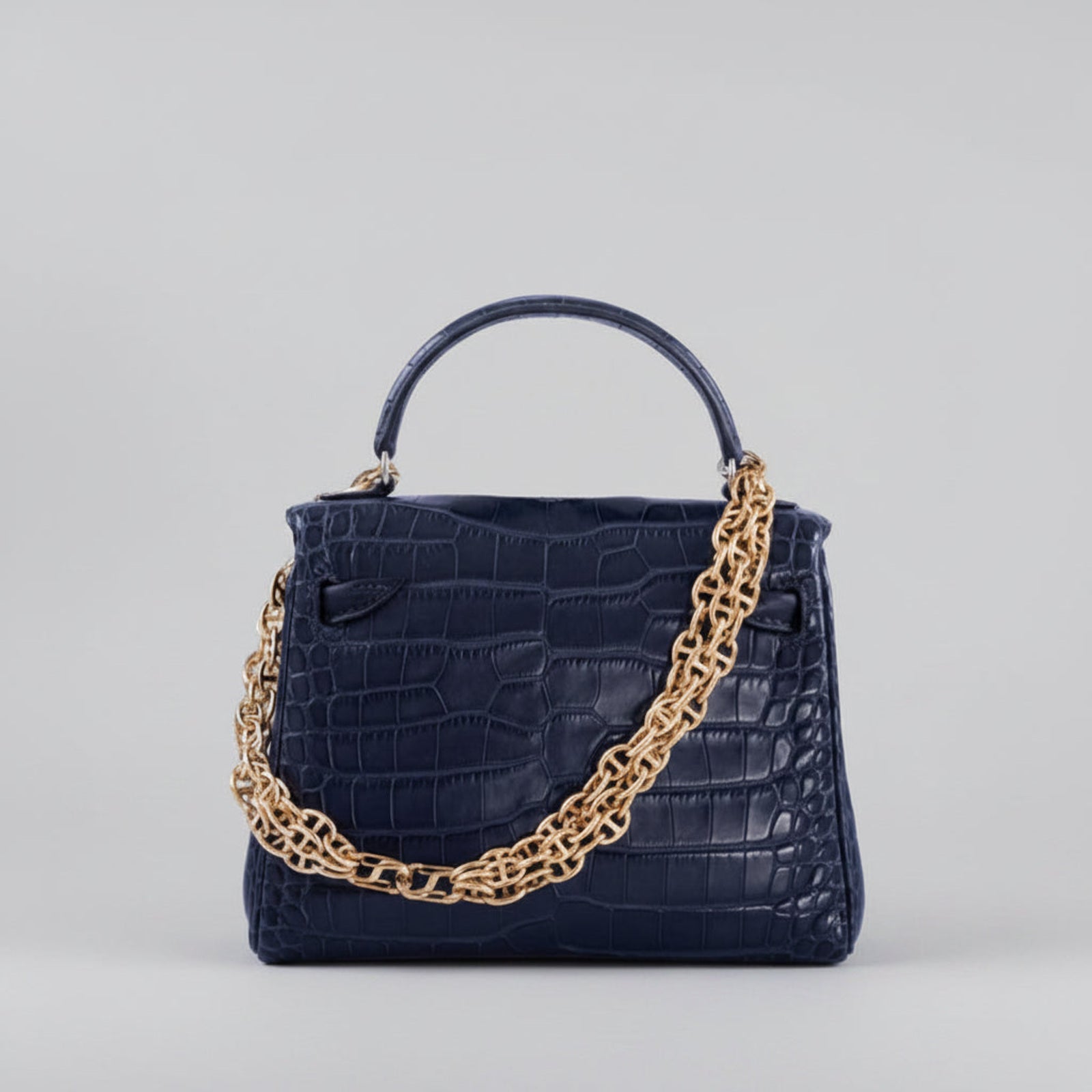 JaneFinds Convertible Triple Mariner Extender styled on a navy Hermès Kelly bag