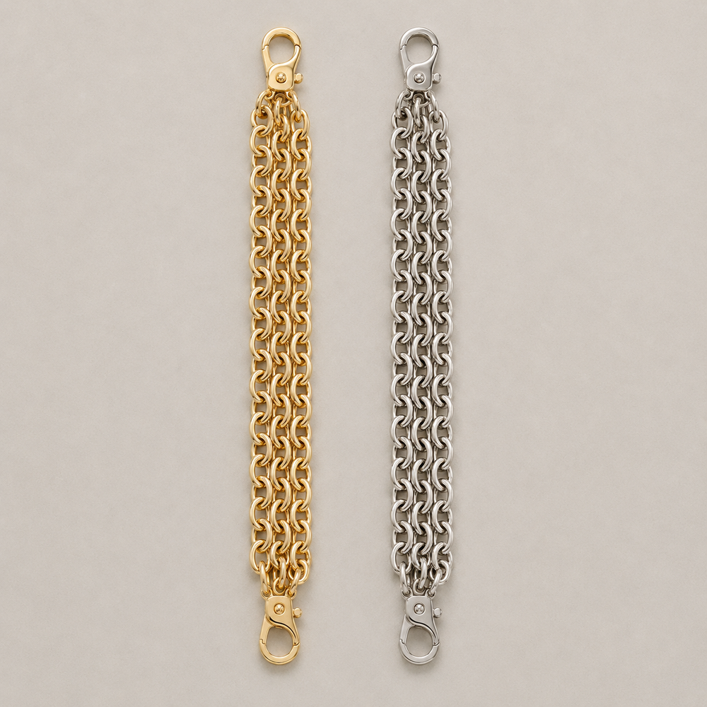 JaneFinds Convertible Triple Mariner Extenders in gold and palladium finishes on a warm neutral studio background