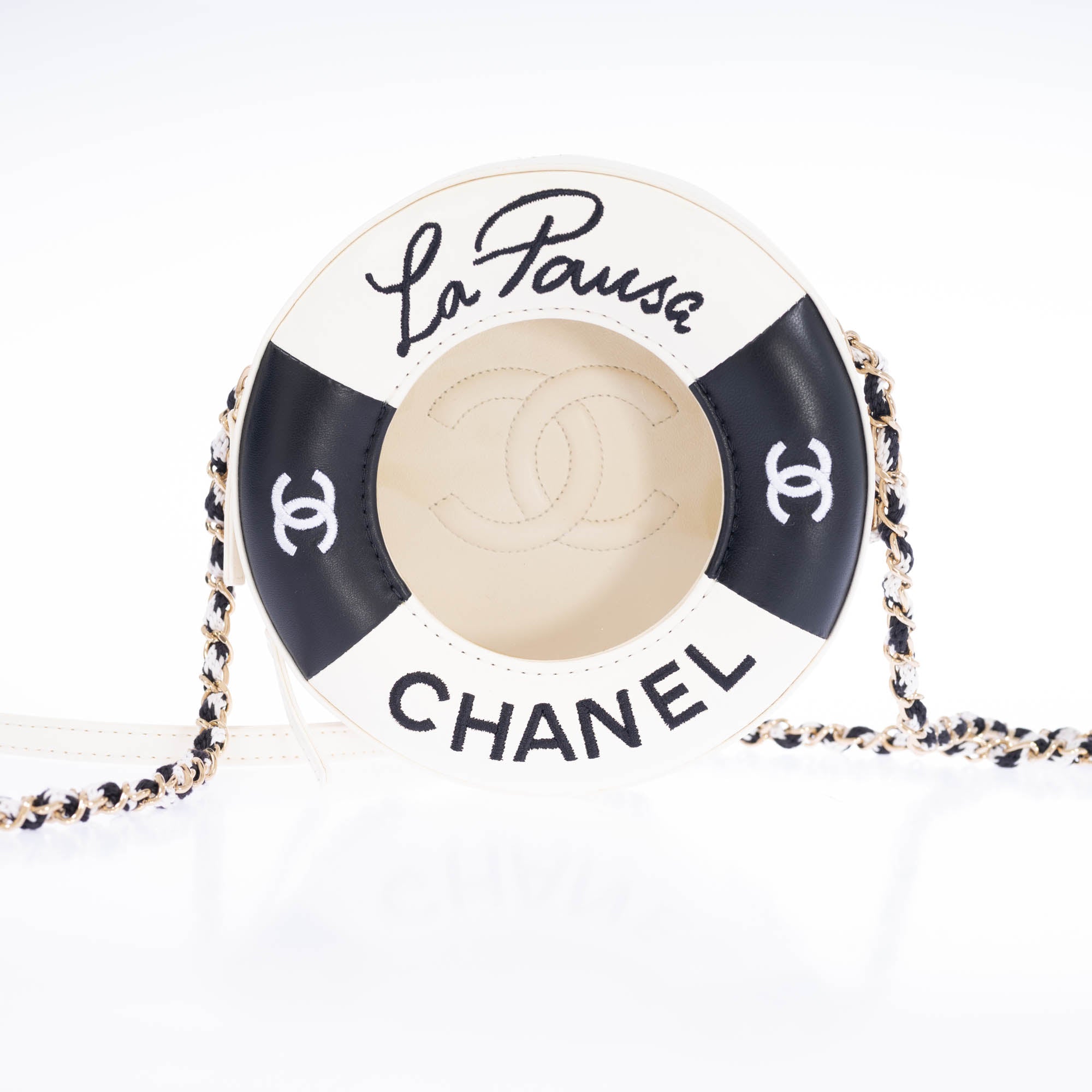 Chanel La Pausa Lifesaver Round Bag White and Black Lambskin Gold Hardware
