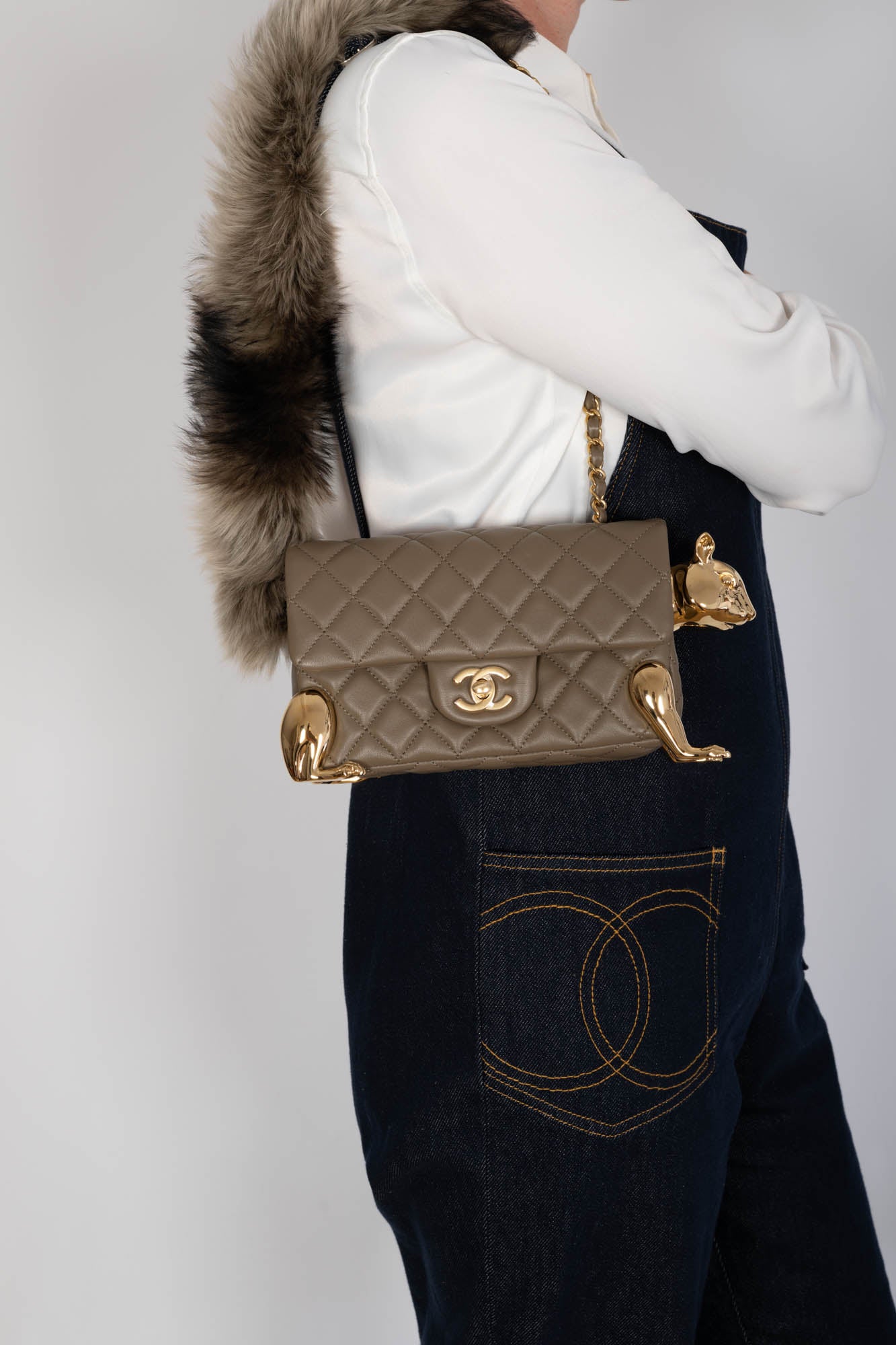 Chanel Squirrel Mini Flap Bag worn on shoulder on model