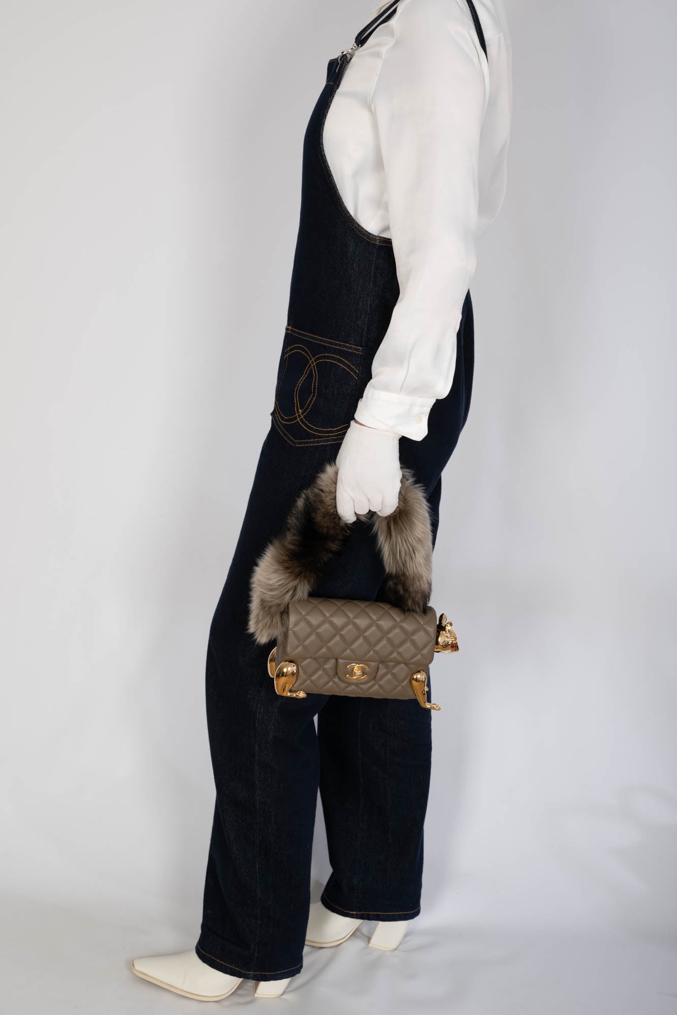 Chanel Squirrel Mini Flap Bag carried at side on model