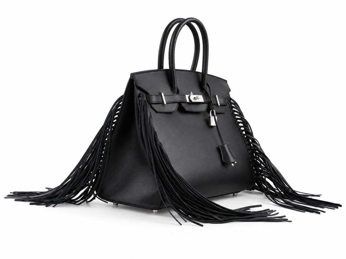 Hermès Birkin 35 Sellier Anate Fringe Noir Evercolor Palladium Hardware, low three-quarter view showing the left gusset and long leather fringe