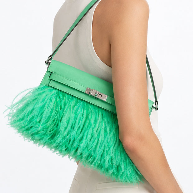 Hermès Kelly Élan Folie Vert Comics Chèvre Chamkila and ostrich feather bag with palladium hardware, shoulder carry studio model view.