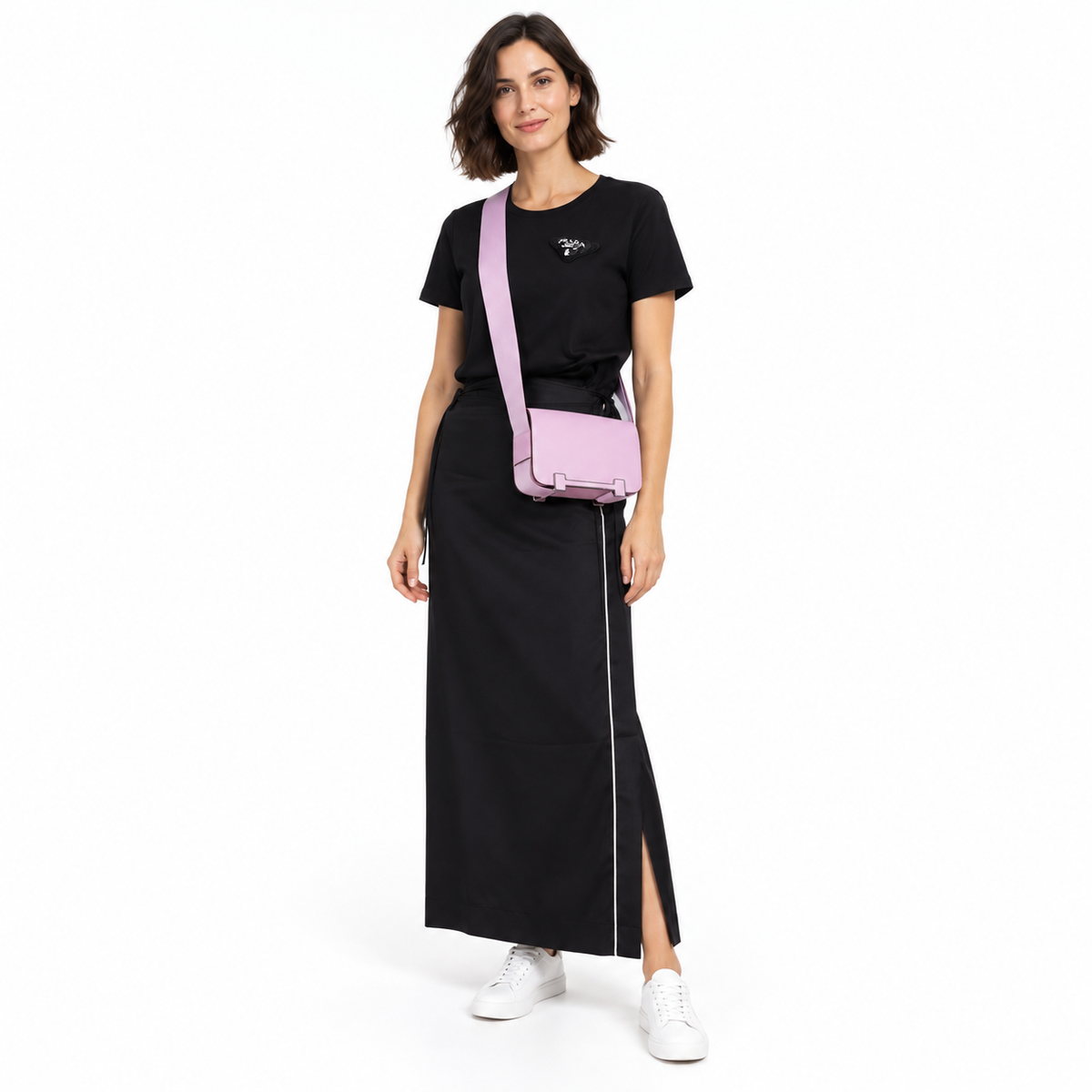 Hermès Geta Bag Mauve Sylvestre Mysore Goatskin with Palladium Hardware on a model in a white studio