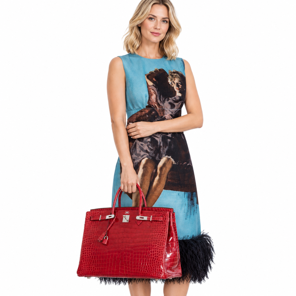 Hermès Birkin 40 Red Braise Porosus Crocodile Palladium Hardware carried by a woman in a white studio
