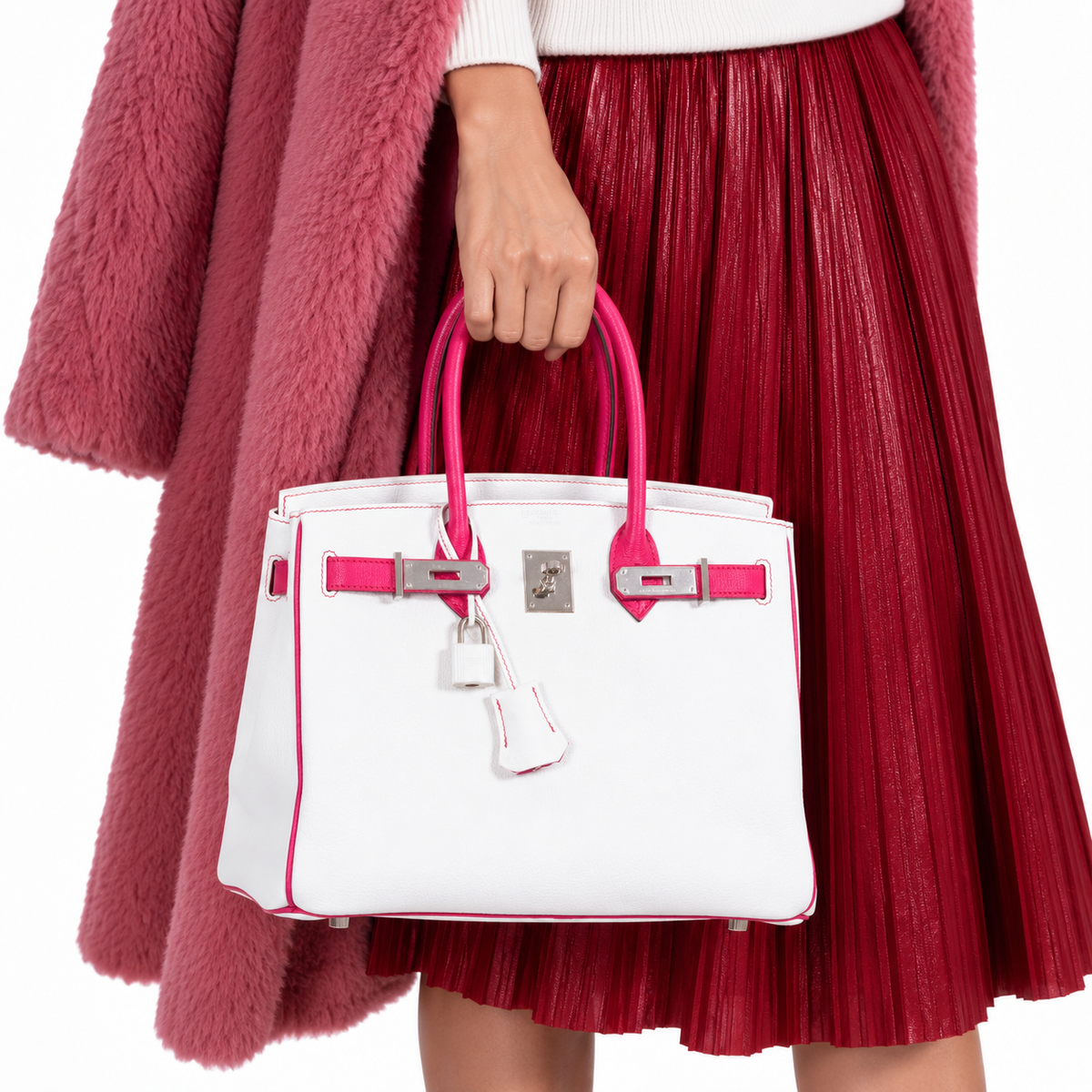 Hermès Birkin 30 HSS Multico White & Fuchsia Chèvre Palladium Hardware carried by a woman in a white studio