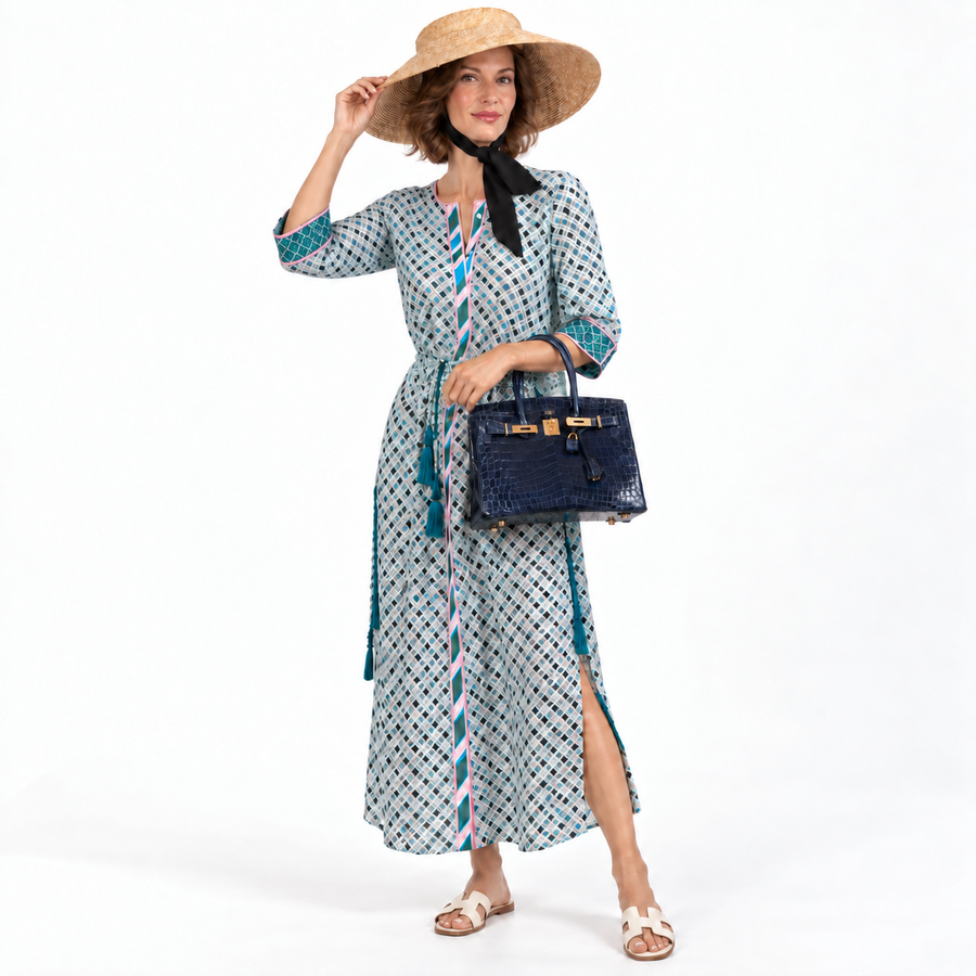 Hermès Birkin 30 Blue Saphir crocodile with gold hardware carried by a model