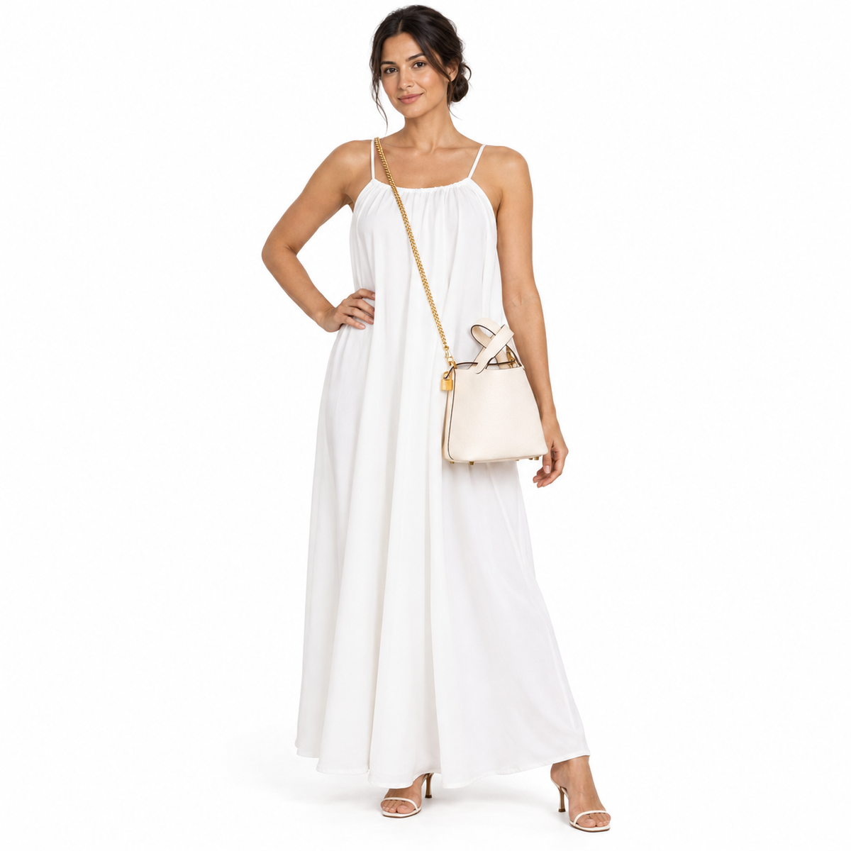 Hermès Picotin Lock 22 Nata Clemence Tote with Gold Hardware on a model in a white studio