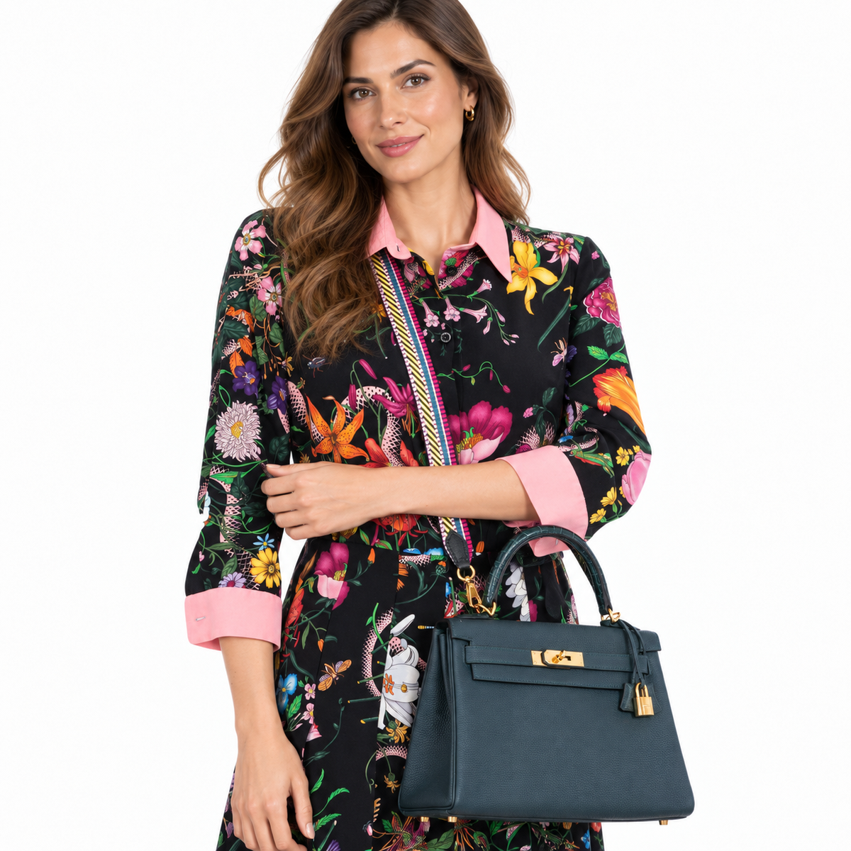 Hermès Kelly 28 Retourne Touch Vert Cypress Togo & Alligator Gold Hardware worn by an adult model in a white studio