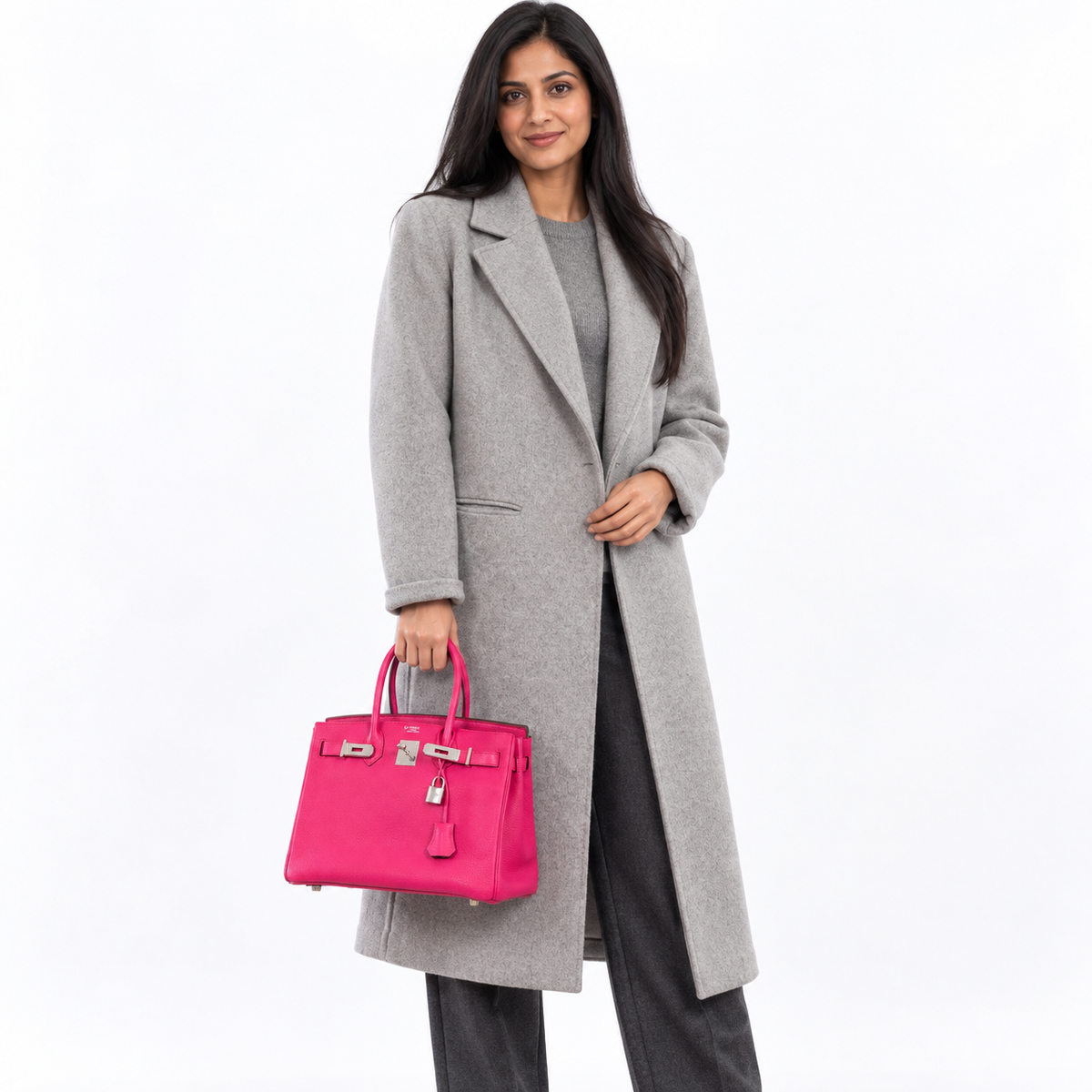 Hermès HSS Birkin 30 Rose Shocking Chèvre and Etoupe palladium hardware carried by a model in a white studio
