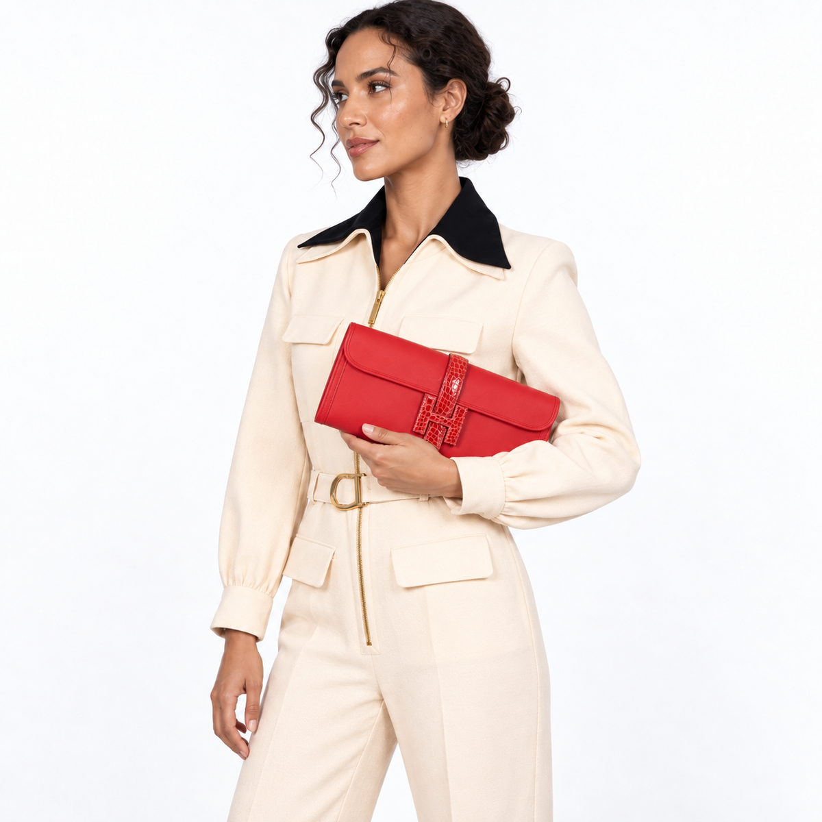 Hermès Jige Élan Rouge de Coeur Shiny Alligator & Swift worn by a model in a white studio