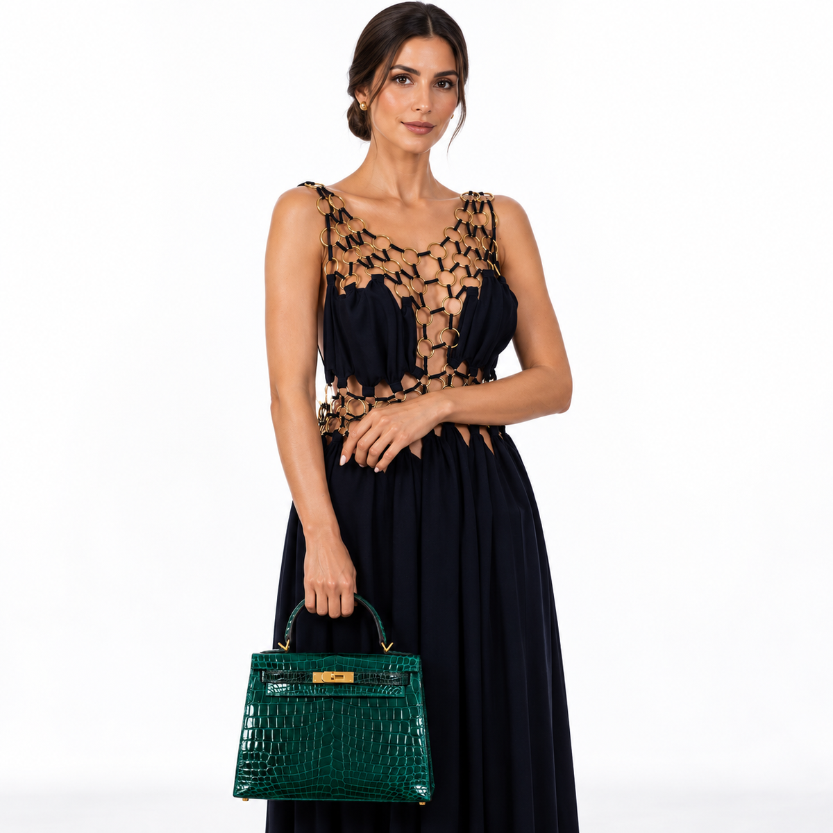 Hermès Kelly 28 Sellier HSS Emerald & Vert Fonce Nilo Crocodile Brushed Gold Hardware shown on a model in a white studio, hand carry
