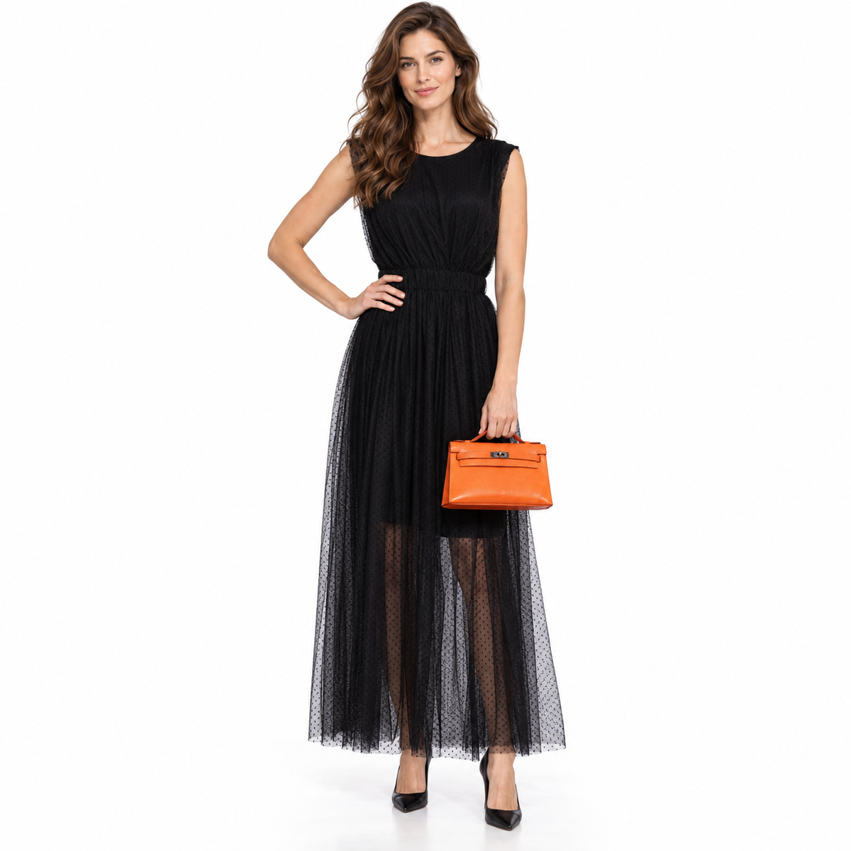 Hermès Kelly Pochette Tangerine Nilo Lizard with Ruthenium Hardware worn by an adult human model on a white studio background