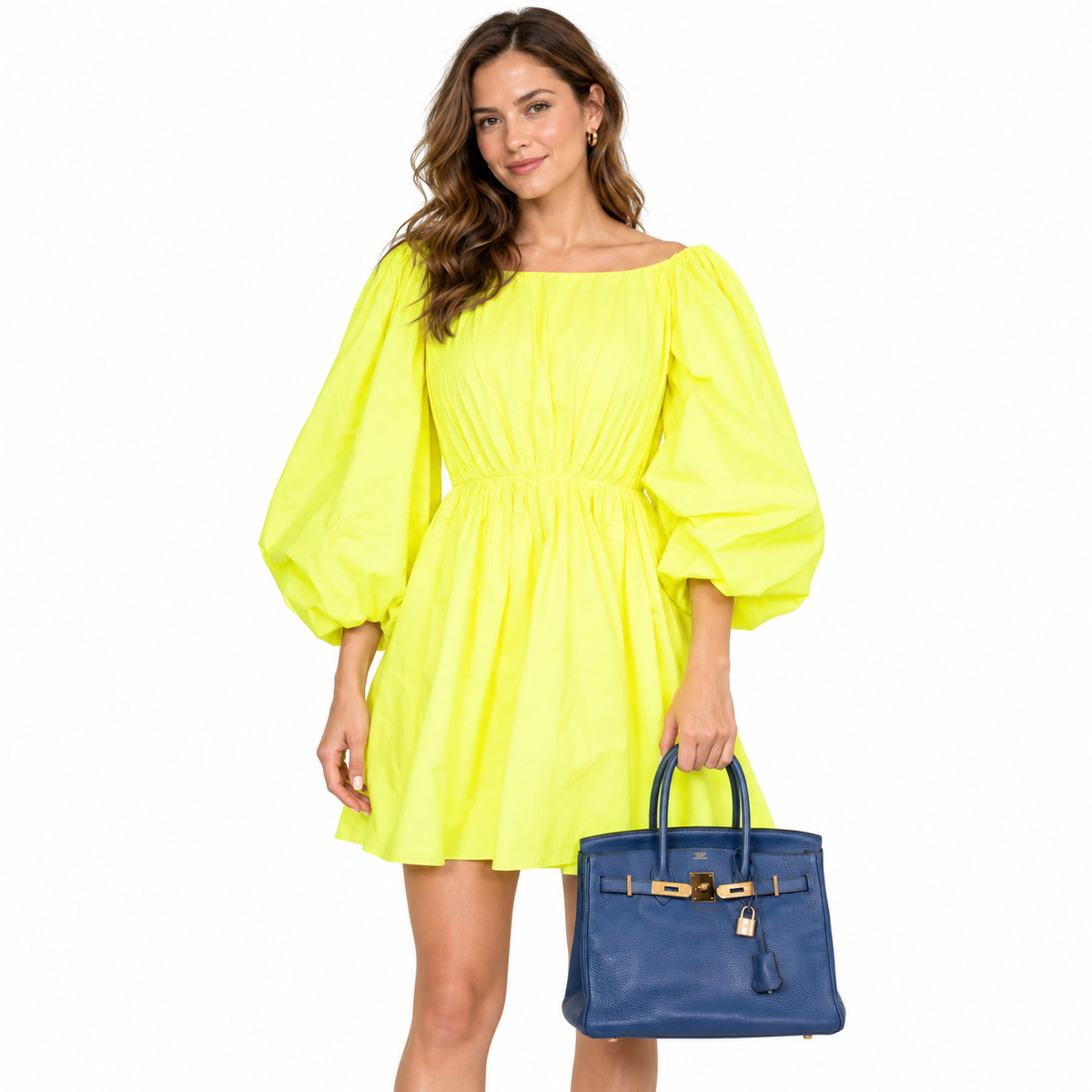 Hermès Birkin 30 Blue Brighton Clemence with Gold Hardware shown on an adult model in a white studio