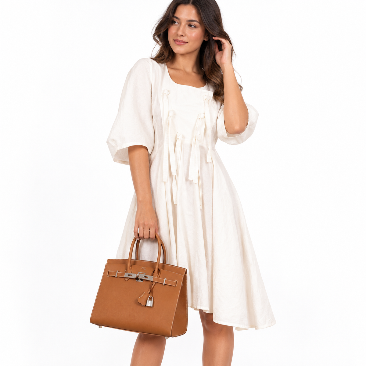 Hermès Birkin 30 Sellier Gold Madame Grain palladium hardware carried by a realistic model on white