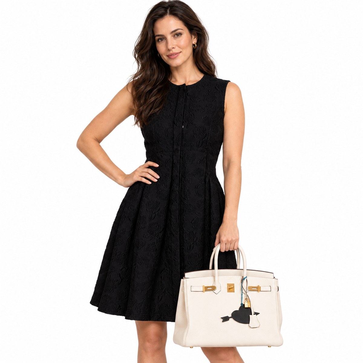 Hermès Birkin 35 Nata Clemence with Gold Hardware shown on an adult model in a white studio