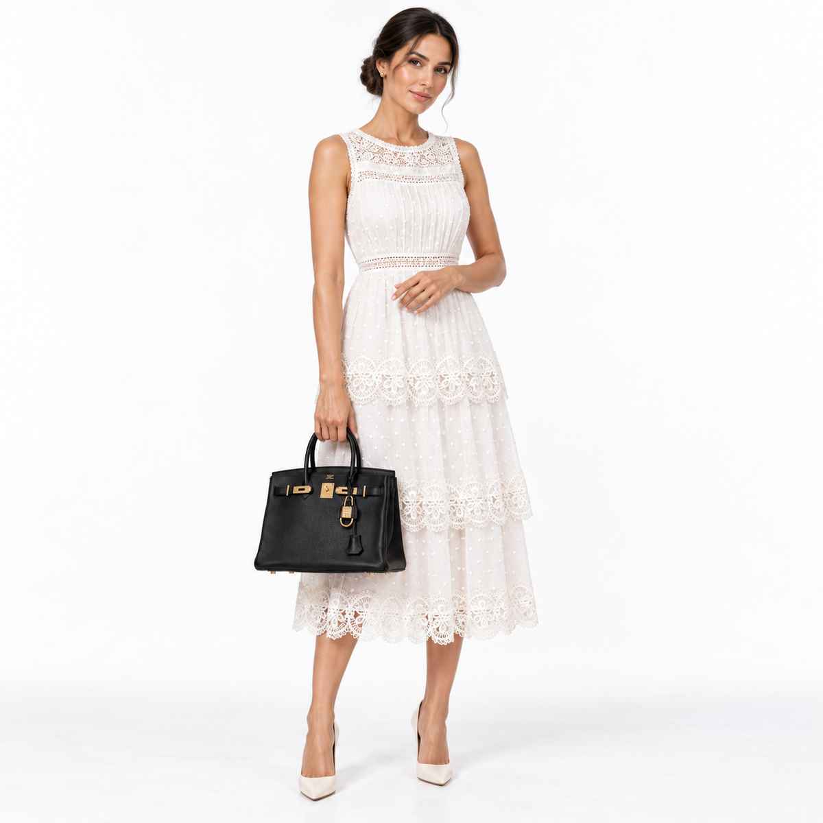 Hermès Birkin 30 Black Navillo Taurillon Leather Gold Hardware shown on a human model in a white studio
