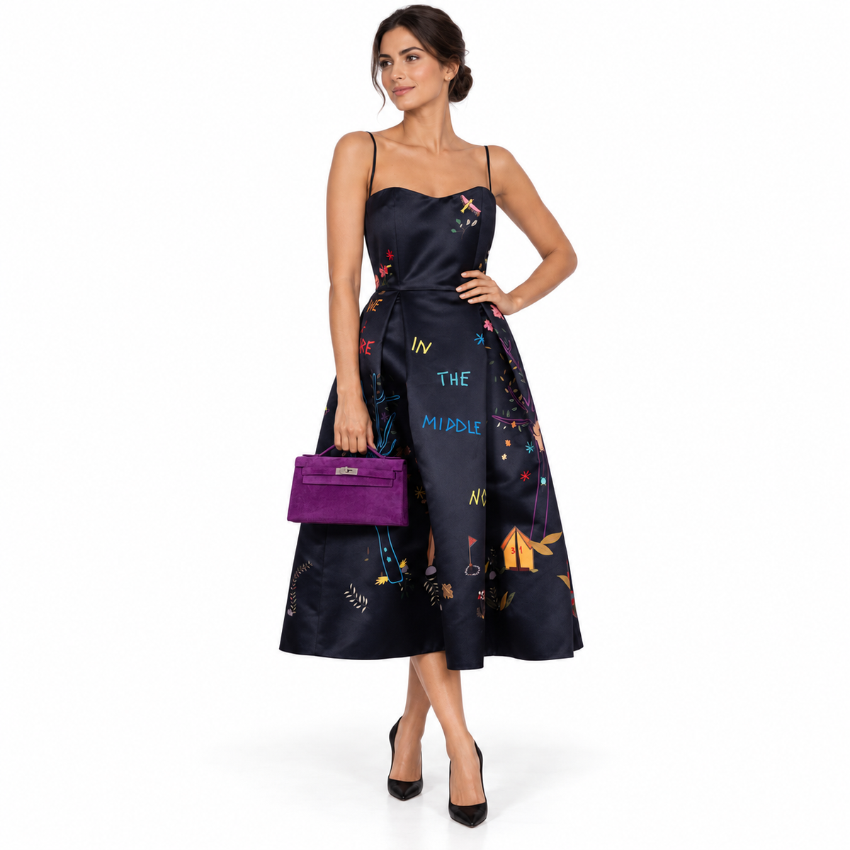 Hermès Kelly Pochette Violet Veau Doblis Suede Palladium Hardware shown on a human model in a white studio