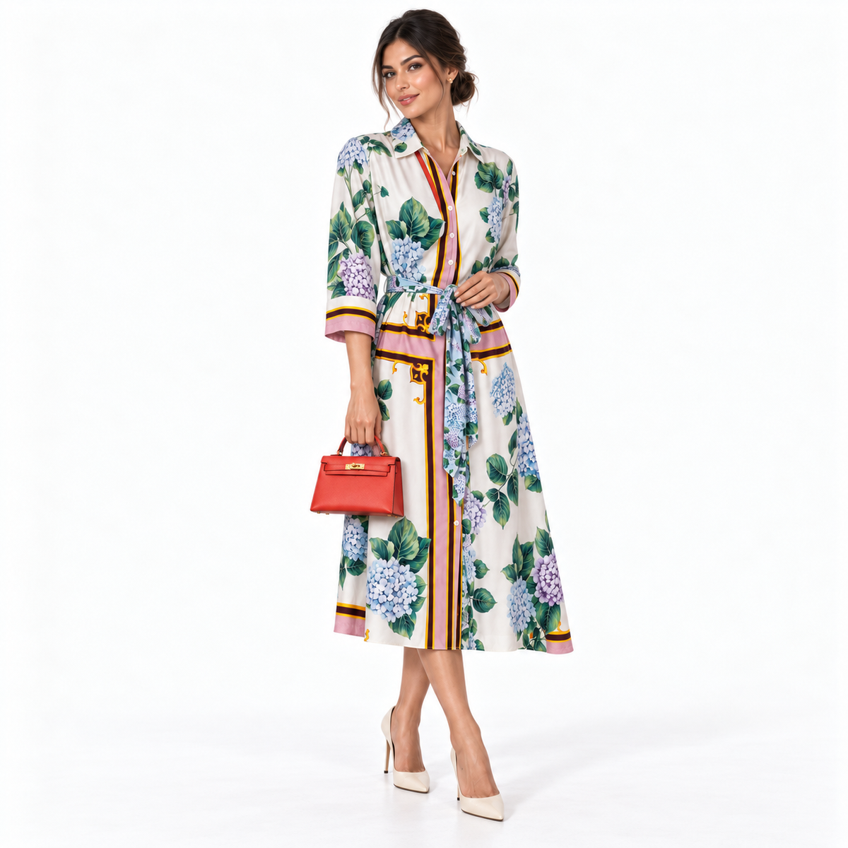 Hermès Kelly 20 Mini II Sellier Capucine Epsom leather Gold Hardware shown on a human model in a white studio
