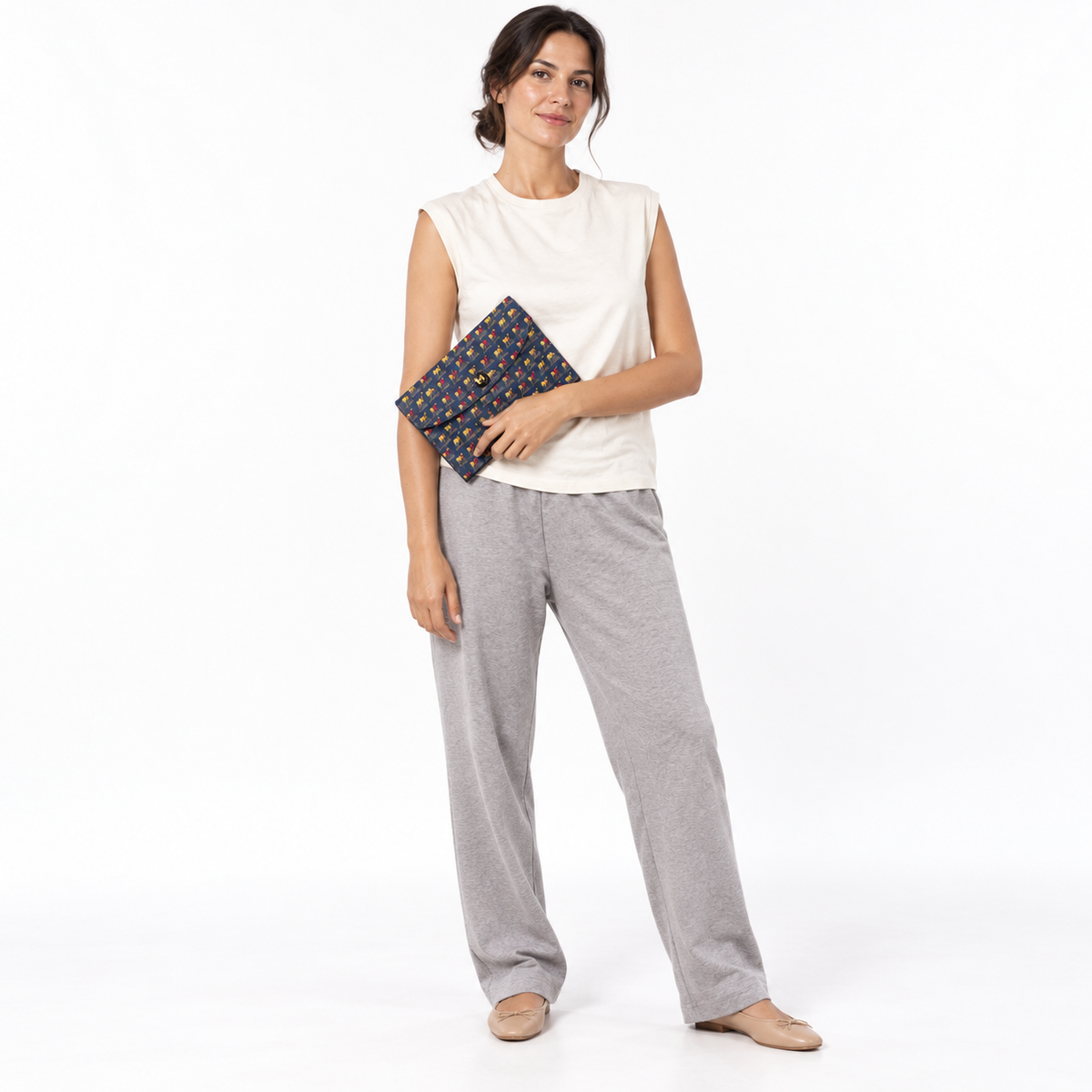 Hermès Rio Horse Printed Leather Clutch Bag & Levan Coin Purse — styled on a human model
