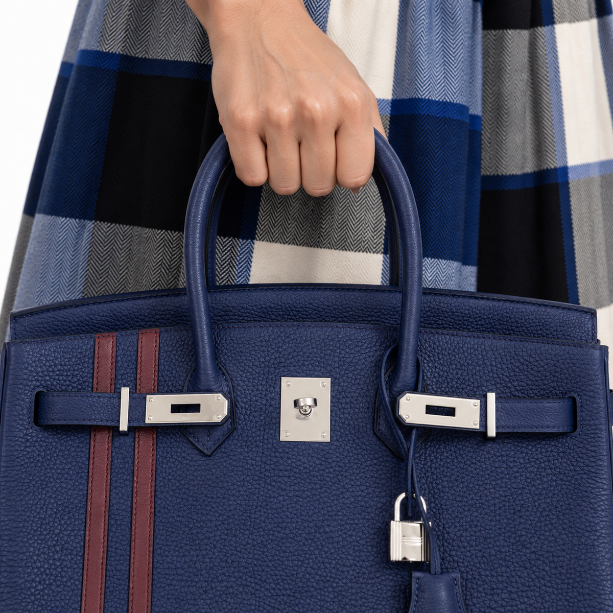 Hermès Birkin 35 Officier Blue Encre Verso Bordeaux Togo Palladium Hardware shown on an adult model in a white studio