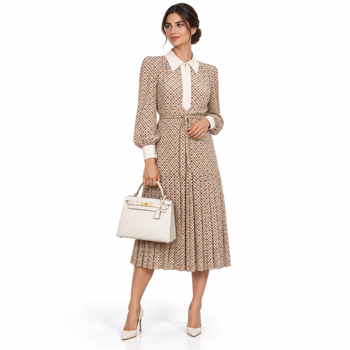 Hermès Kelly 28 Sellier Beton Ostrich with Gold Hardware shown on a human model in a white studio