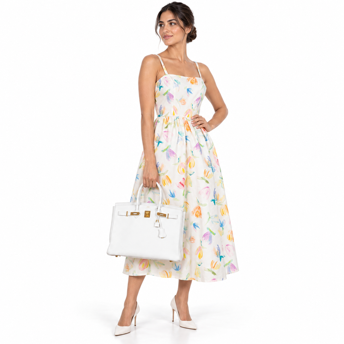 Hermès Birkin 35 White White Clemence Gold Hardware shown on a human model in a white studio
