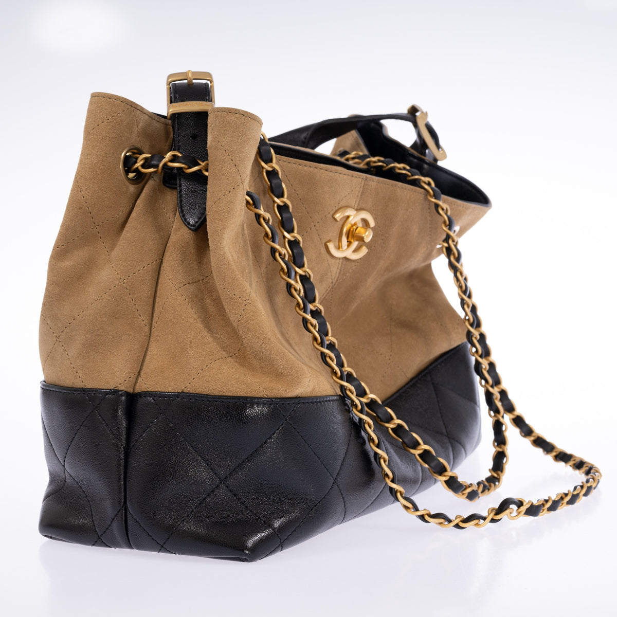Chanel Small Coco Base Shopping Bag Beige Suede and Black Leather Gold Hardware, side view with the top handle buckle