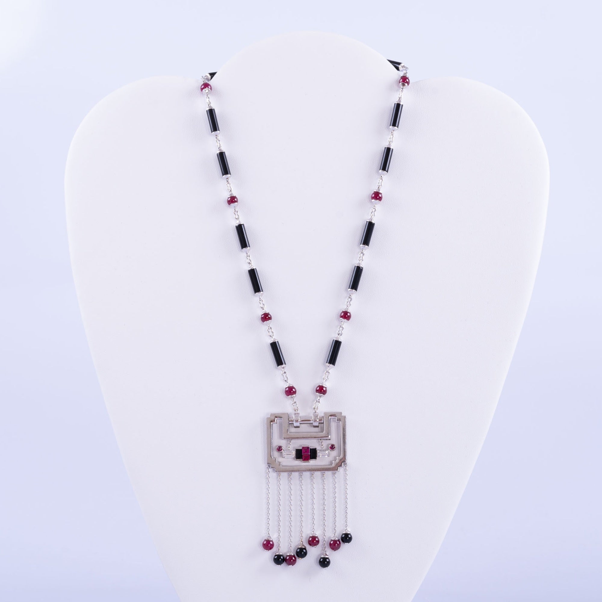 Estate Jewelry Cartier Diamond, Ruby And Onyx 'Le Baiser du Dragon' Necklace