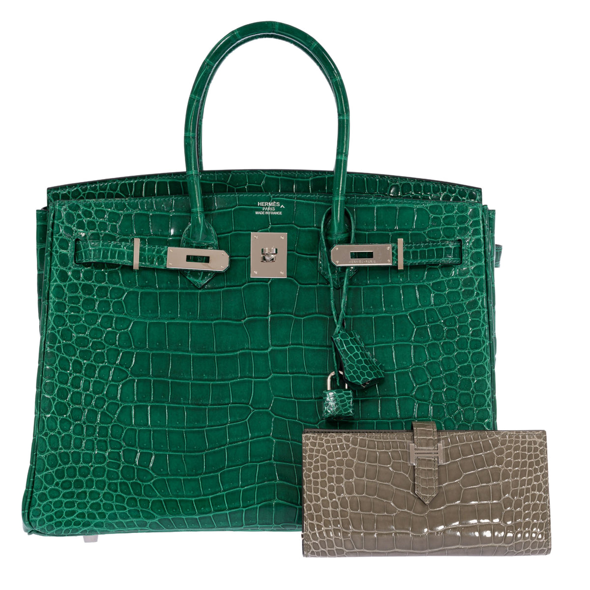 Hermès Béarn Soufflet Gris Ciment Shiny Alligator Palladium Hardware, shown with a green Birkin, sold separately