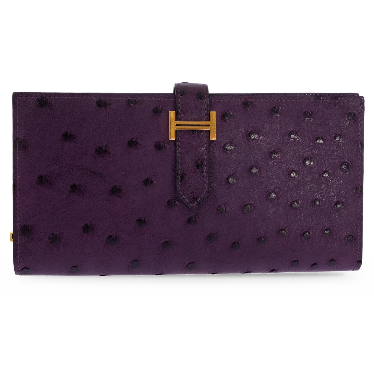Hermès Béarn Wallet Violine Ostrich Gold Hardware, front view, closed with the tab through the H clasp