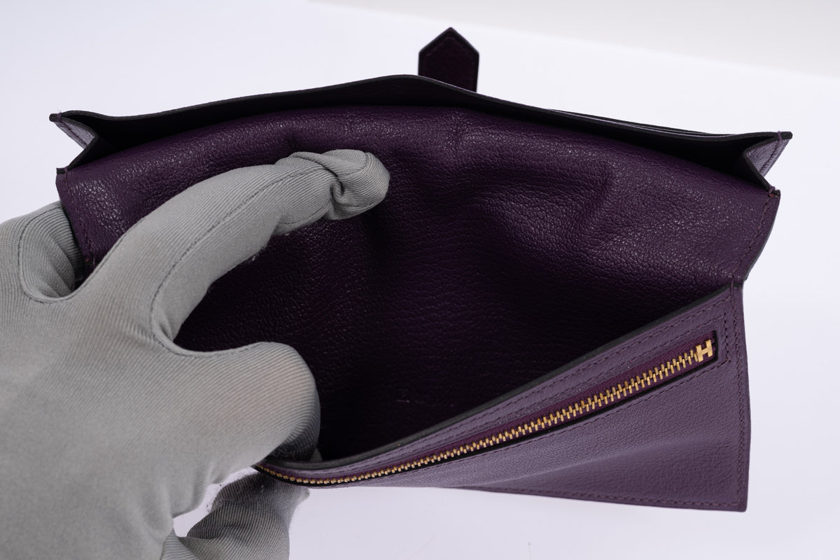 Hermès Béarn Wallet Violine Ostrich Gold Hardware, zipped coin compartment held open