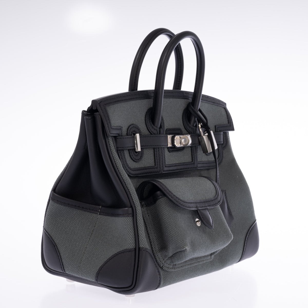 Hermès Birkin 25 Cargo Vert Mangrove Toile Goéland and Noir Swift Palladium Hardware, three-quarter view from the left with the side pocket