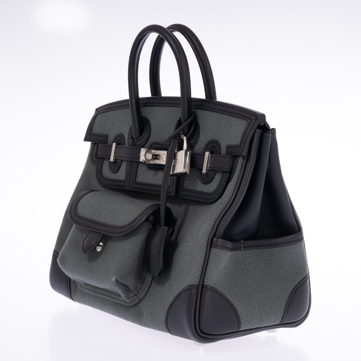 Hermès Birkin 25 Cargo Vert Mangrove Toile Goéland and Noir Swift Palladium Hardware, three-quarter view from the right with the side pocket and protective plastic on the turn-lock and padlock
