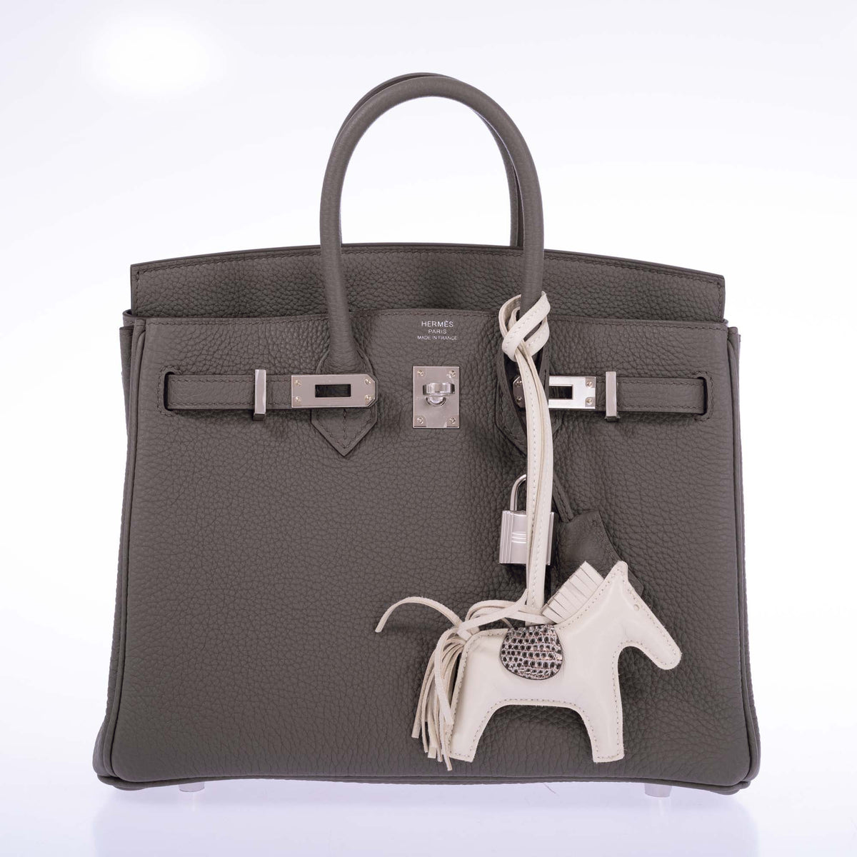 Hermès Birkin 25 Étain Togo Palladium Hardware, open front view with an ivory horse charm, sold separately.