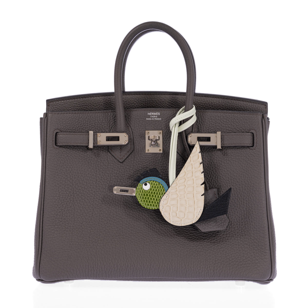 Hermès Birkin 25 Étain Togo Palladium Hardware, open front view with an ivory and green Hermès Birdy charm, sold separately.
