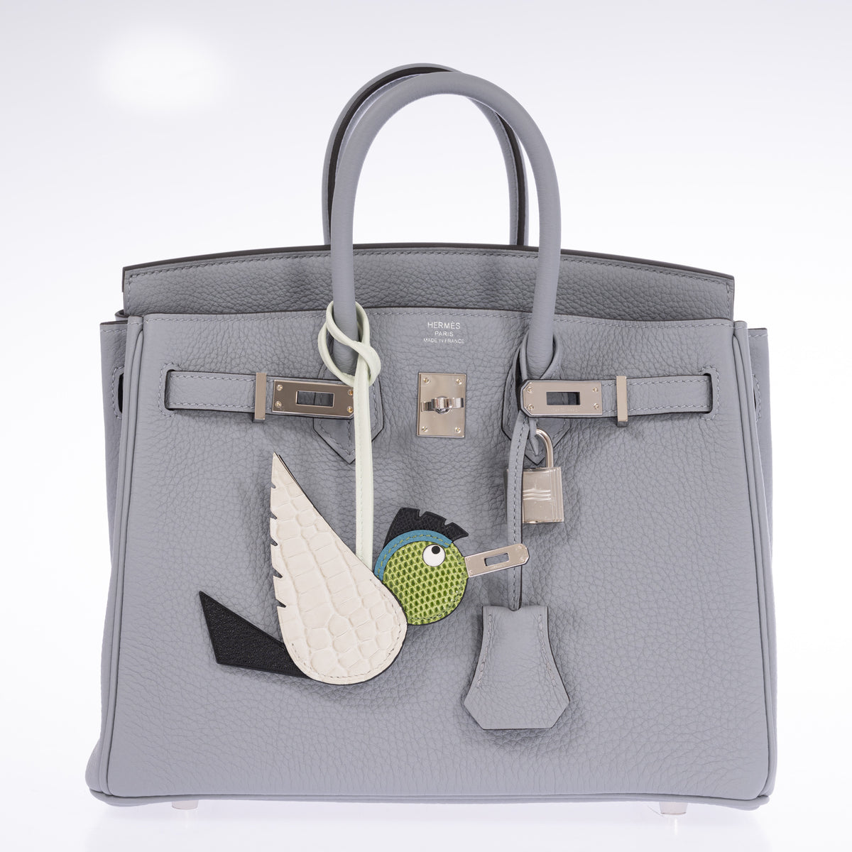 Hermès Birkin 25 Gris Pantin Togo Palladium Hardware, front view with the flap open and straps unfastened, styled with a bird charm, sold separately