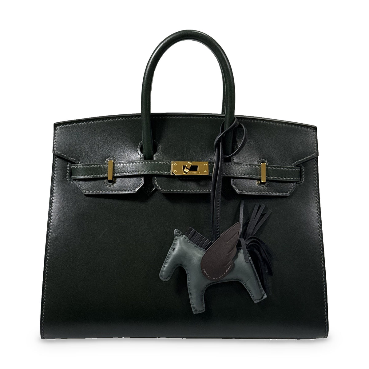 Hermès Birkin 25 Sellier Vert Foncé Box Calf Gold Hardware, shown with a winged horse charm, sold separately.