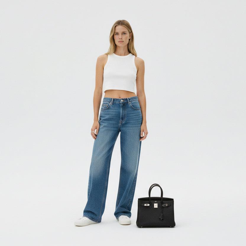 Hermès Birkin 30 Noir Togo Palladium Hardware shown with a model