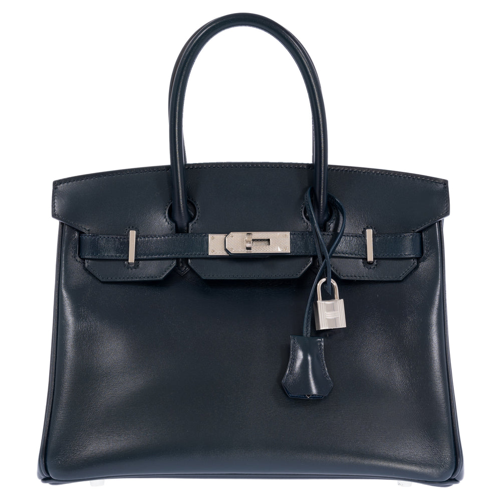 Hermès Birkin 30 Bleu de Prusse Box Calf Guilloche Palladium Hardware, front view with the flap closed and the straps fastened at the turn-lock