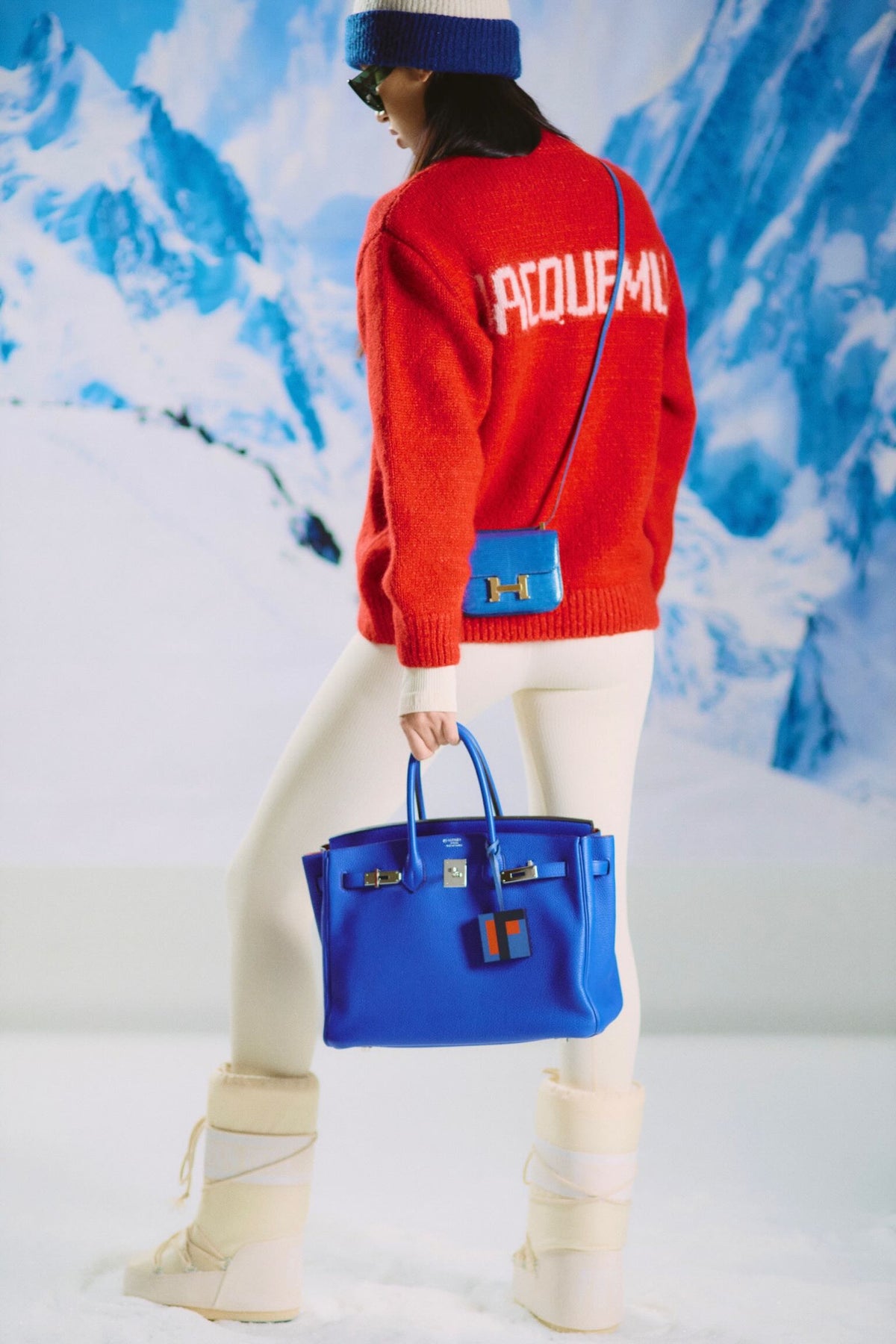 Hermès Birkin 35 HSS Bleu Electrique / Fuchsia Interior Togo Palladium Hardware, carried by a model in a snow scene
